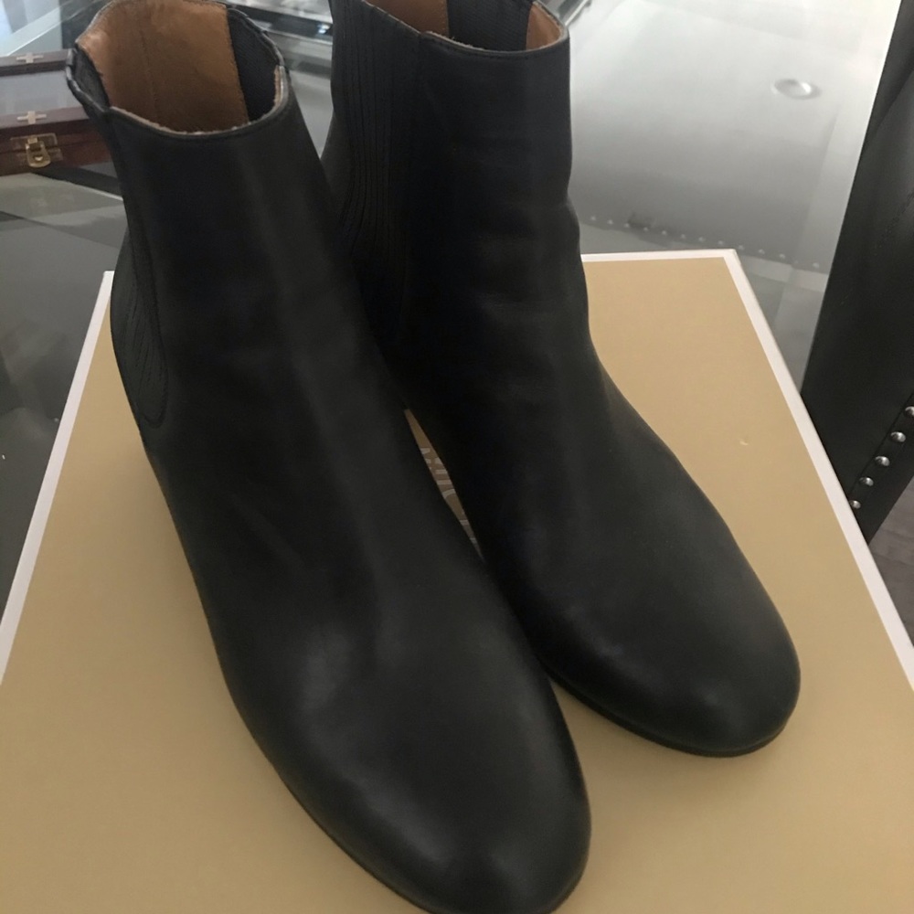 Black Woman’s leather bootie